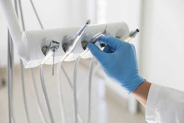 Professional Invisalign Clear Aligners technician working in Lapeer, MI